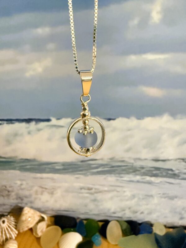 pale blue Sea Glass pendant necklace on a sterling silver chain